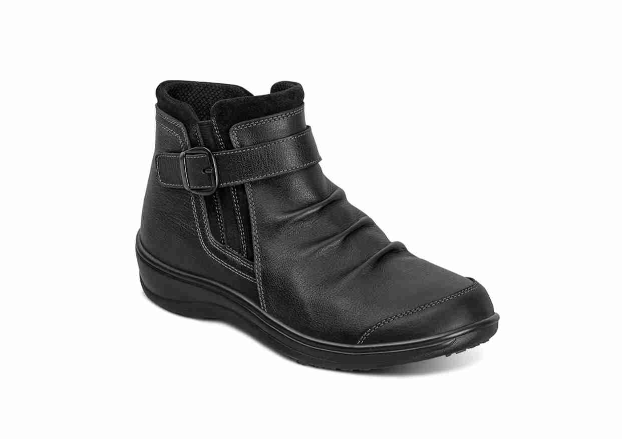 Botas con correa de velcro